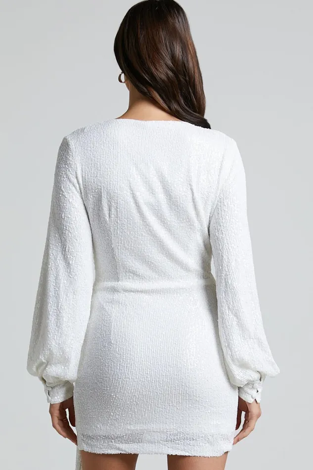 Claudilyn Mini Dress 8211 Sequin Drape Detail Long Sleeve Faux Wrap Dress In White Women Showpo Dresses