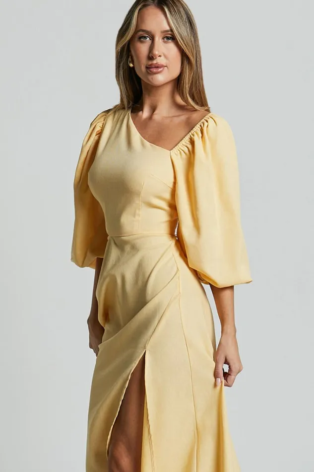 Rhyne Midi Dress 8211 Asymmetric Puff Sleeve Side Cut Out A Line Dress In Lemon Women Showpo Conscious