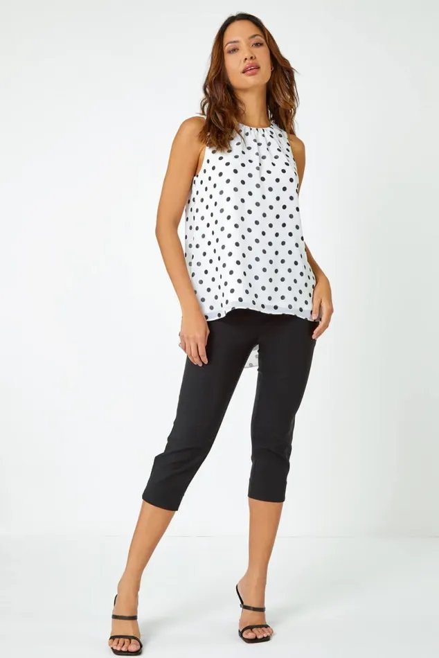 Women Ivory Sleeveless Polka Dot Top Roman Tops