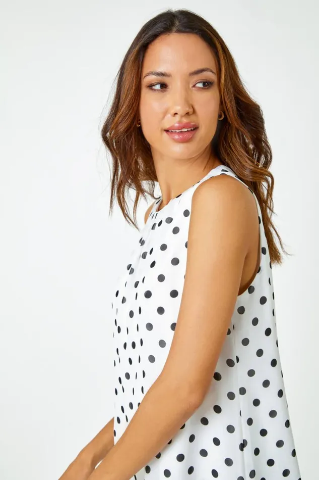 Women Ivory Sleeveless Polka Dot Top Roman Tops