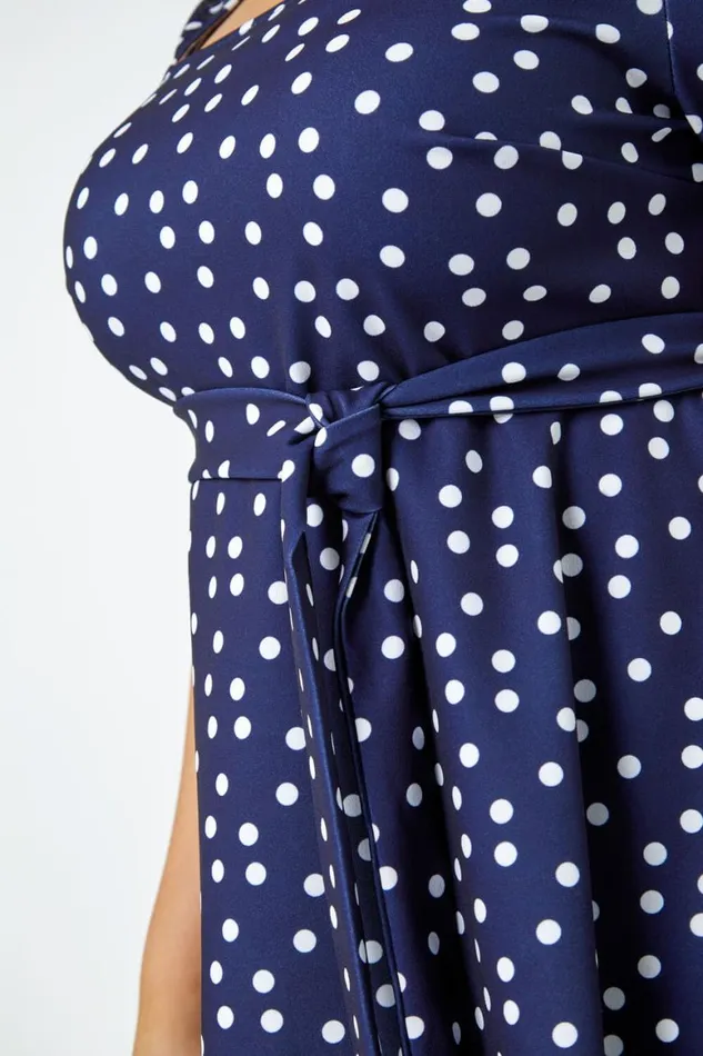 Women Navy Curve Stretch Polka Dot Peplum Top Roman Tops
