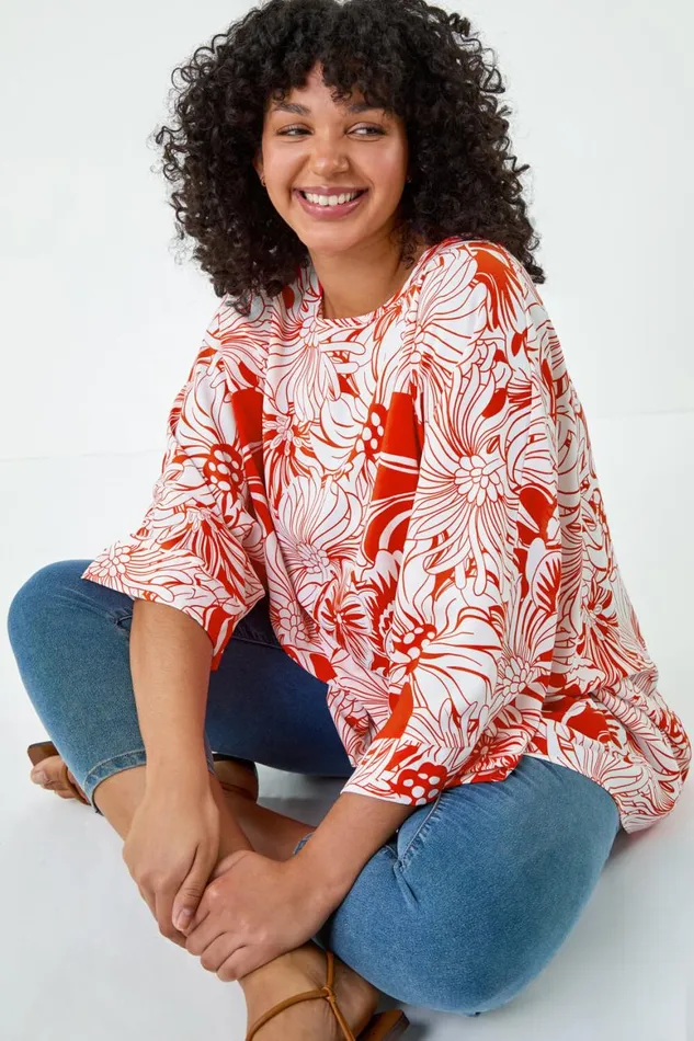 Women Orange Curve Floral Print Dipped Hem Top Roman Tops