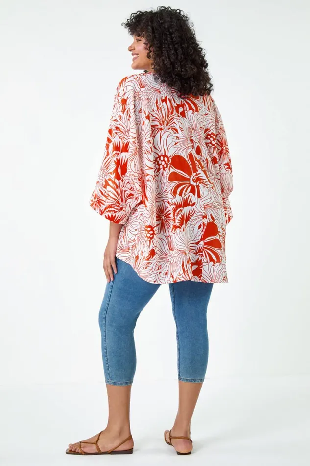 Women Orange Curve Floral Print Dipped Hem Top Roman Tops