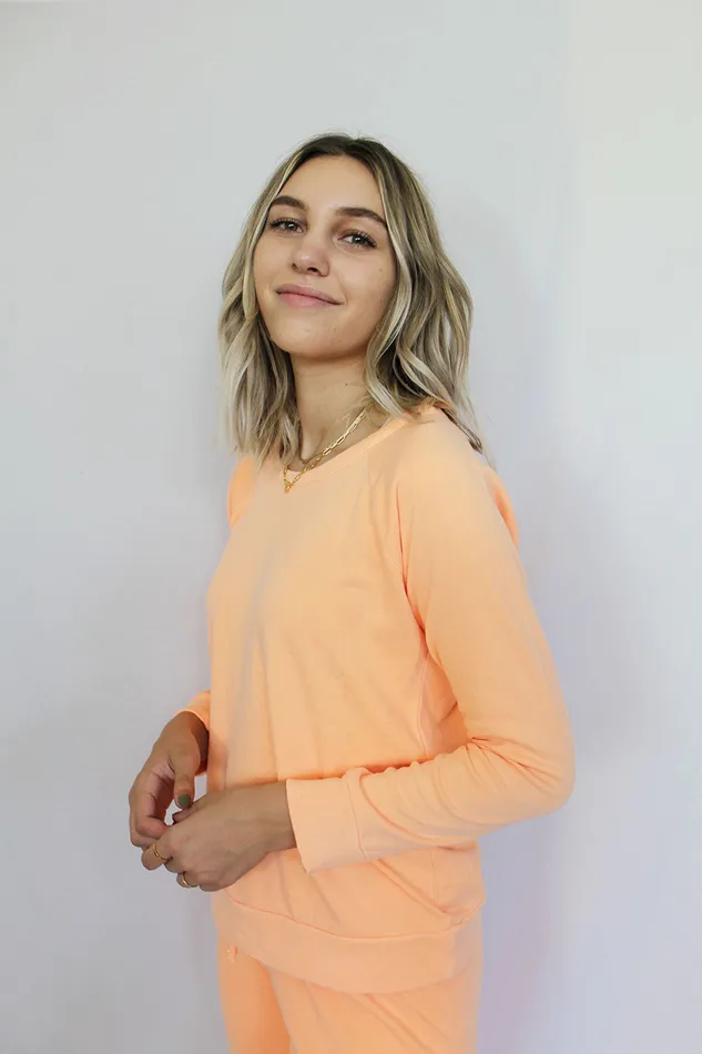 Womens Cotton Fleece Long Sleeve Raglan Pullover in Neon Orange Loungewear Chaser Brand